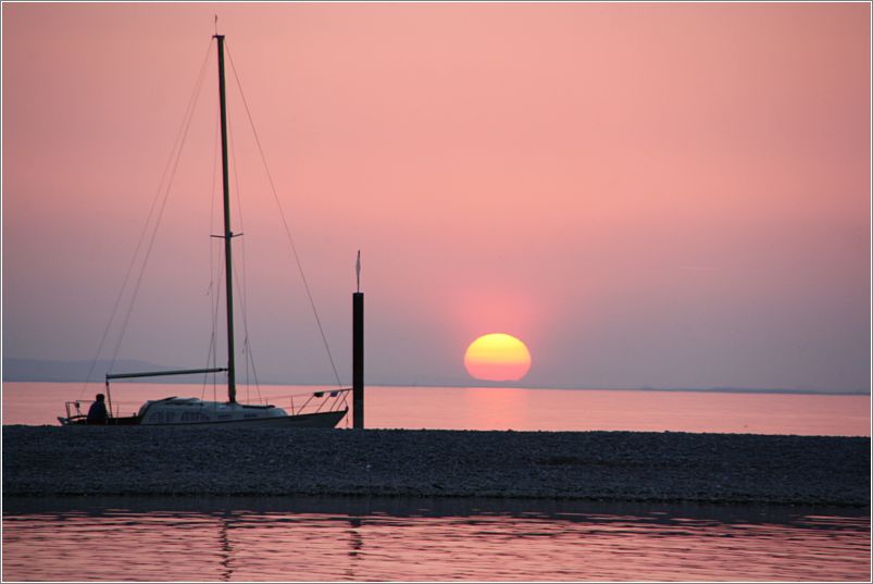 Sonnenuntergang und Boot